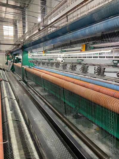 bale net wrap weaving